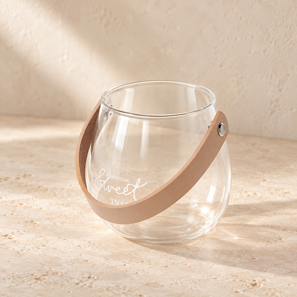 SOGNA clear glass decorative vessel with leather handle