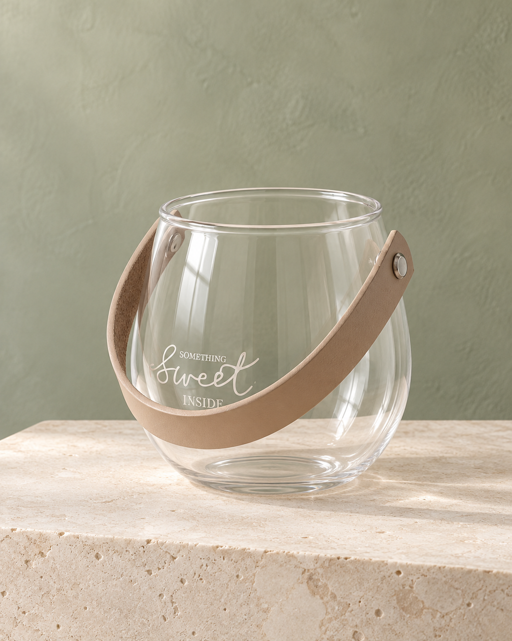 SOGNA script glass decorative vessel in a refined sage and limestone interior