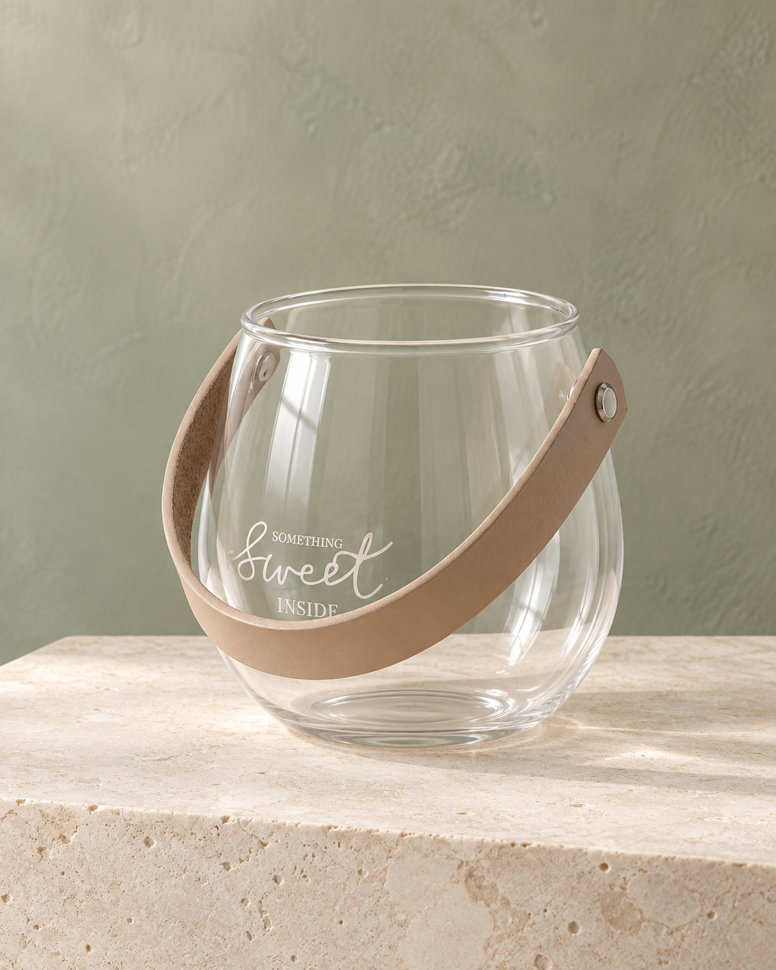 SOGNA script glass decorative vessel in a refined sage and limestone interior